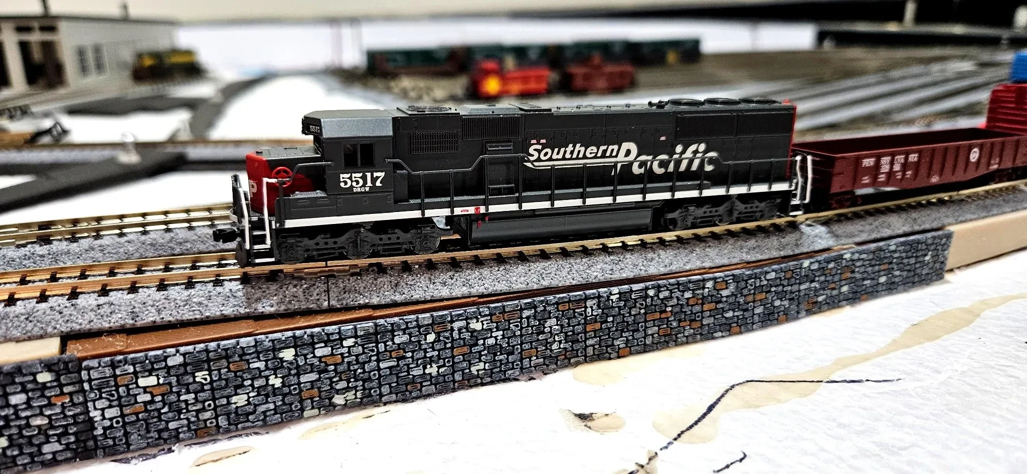 N scale stone fence walls placed in a scenic layout